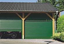 Pair of green Seceuroglide doors with vision slats and vented slats
